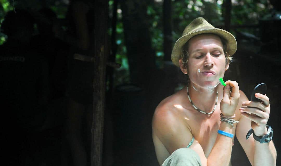 Man Removing Facial Hair Using a Razor Man Removing Facial Hair Using a Razor
