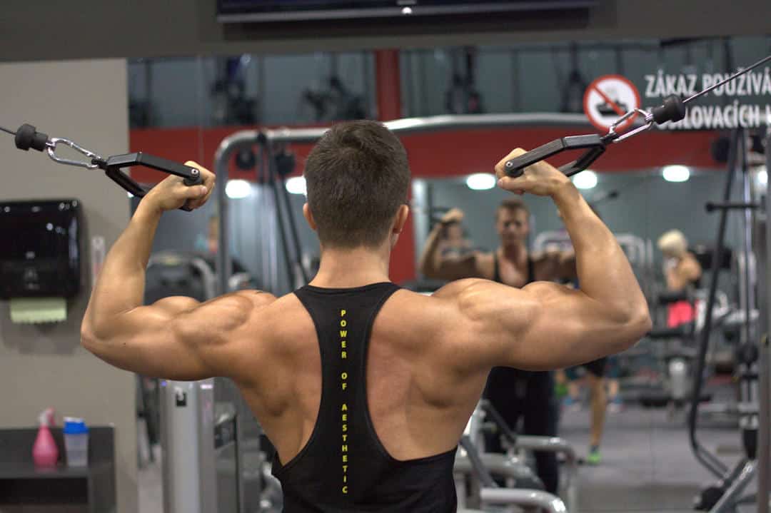 This Bodybuilder Uses a Back Hair Shaver